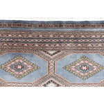 Close-up view of a Light Slate Grey Rajasthani Hand Knotted Area Rug, showcasing intricate patterns and textures. Ideal for adding warmth and style to area rugs for living room, especially in an 8x10 size.