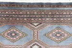 Close-up view of a Light Slate Grey Rajasthani Hand Knotted Area Rug, showcasing intricate patterns and textures. Ideal for adding warmth and style to area rugs for living room, especially in an 8x10 size.