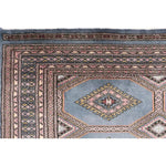 Close-up view of a Light Slate Grey Rajastani Hand Knotted Area Rug, showcasing intricate patterns and detailed craftsmanship. Perfect for adding elegance to area rugs for living room or as an 8x10 living room rug.