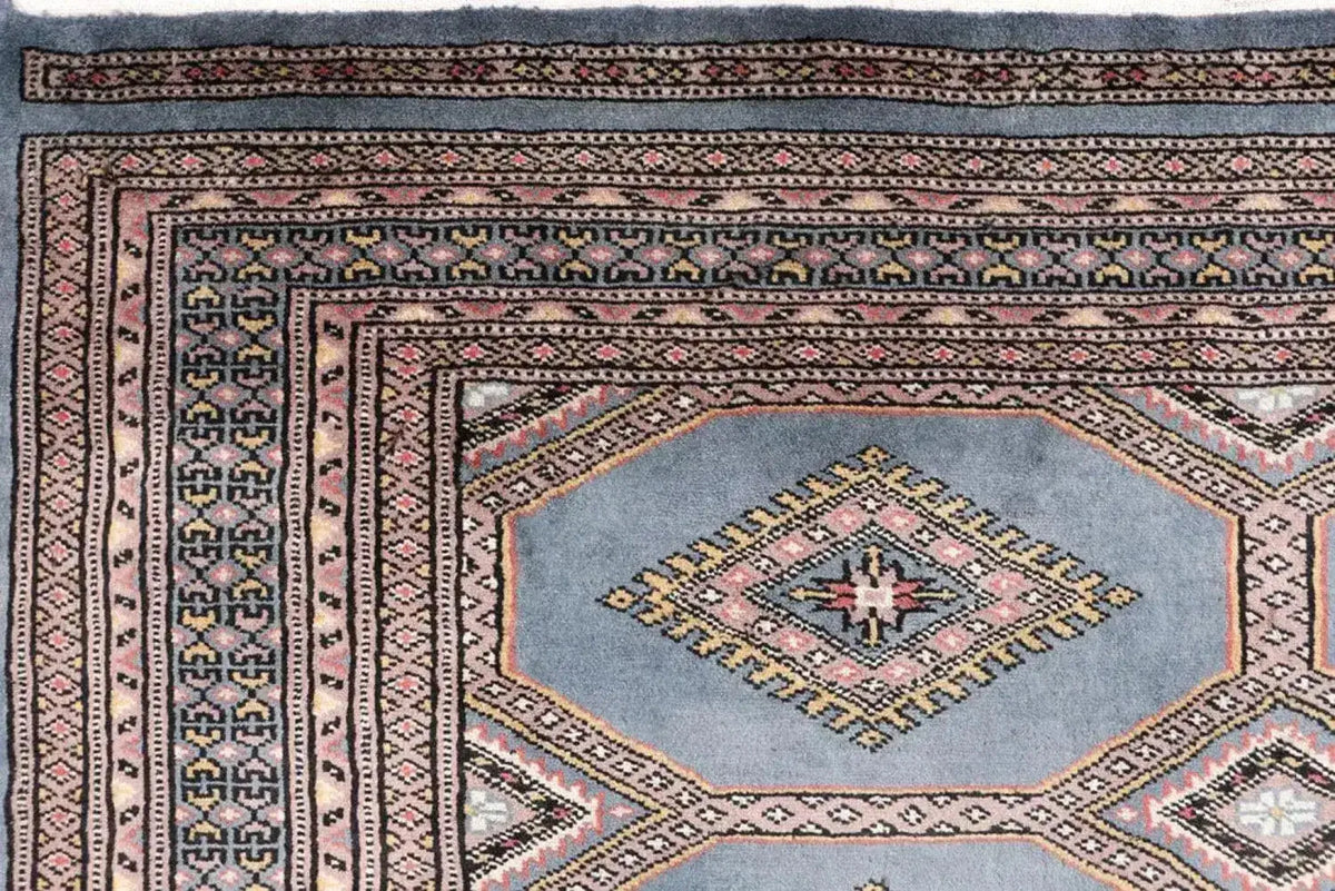 Close-up view of a Light Slate Grey Rajastani Hand Knotted Area Rug, showcasing intricate patterns and detailed craftsmanship. Perfect for adding elegance to area rugs for living room or as an 8x10 living room rug.