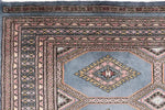 Close-up view of a Light Slate Grey Rajastani Hand Knotted Area Rug, showcasing intricate patterns and detailed craftsmanship. Perfect for adding elegance to area rugs for living room or as an 8x10 living room rug.