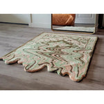 Lime Green Melting Traditional Persian Hand Tufted Wool Rug in a modern living room setting. This area rug features an abstract pattern, perfect for adding a touch of elegance to dining rooms or living room areas. The wool rug showcases intricate Persian design elements, complementing contemporary interiors.