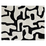 Stylish area rug featuring a modern abstract design in black and white, perfect for adding a contemporary touch to any living room. This wool rug offers a unique pattern that enhances the decor of living room area rugs.