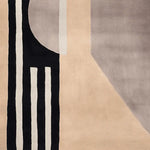 Top view of a contemporary area rug featuring a modern abstract design with bold black and cream stripes. Made from high-quality wool, it's perfect for adding a stylish touch to living rooms. Ideal as an 8x10 rug, it complements various decor styles.