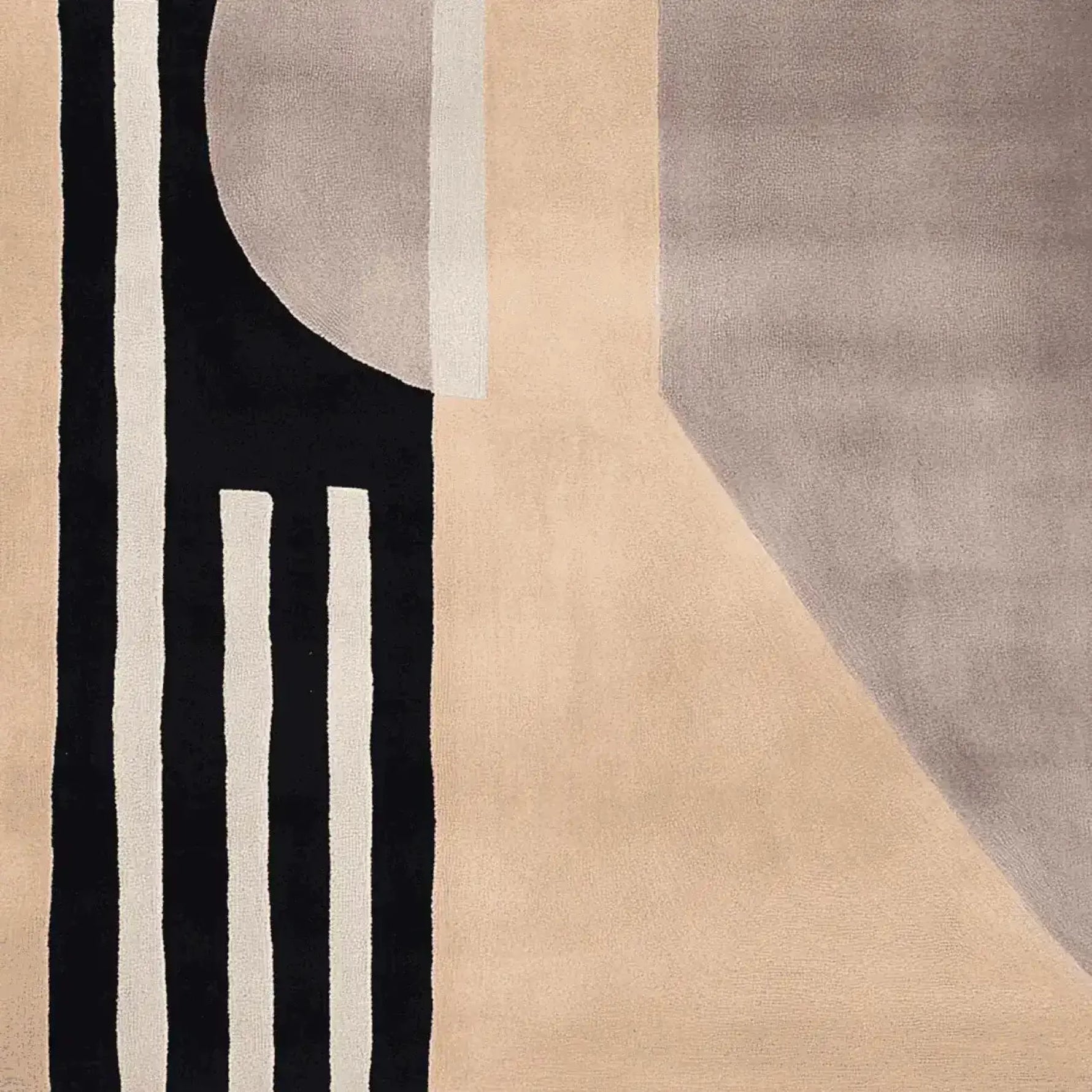 Top view of a contemporary area rug featuring a modern abstract design with bold black and cream stripes. Made from high-quality wool, it's perfect for adding a stylish touch to living rooms. Ideal as an 8x10 rug, it complements various decor styles.