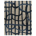 Top view of the Lined in Thought Hand Tufted Area Rug, featuring an abstract design with bold navy blue lines against a neutral beige background. This contemporary wool rug is perfect for large living rooms, adding a modern touch to your space.