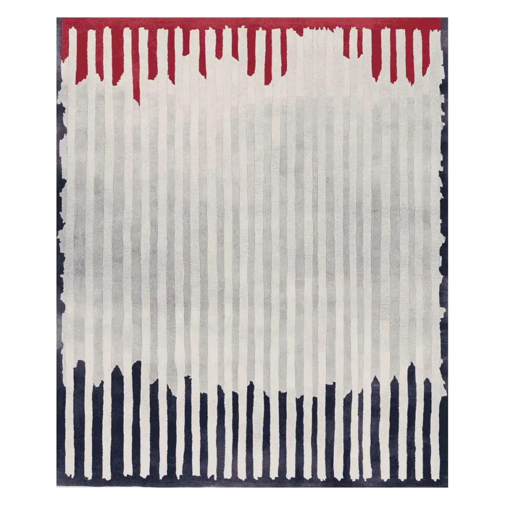 A contemporary area rug featuring a hand-tufted design with vertical lines in shades of red, white, and blue. This wool rug is perfect for adding a modern touch to living room spaces, offering both style and comfort.