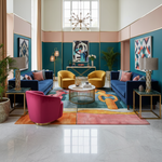 Modern living room with a contemporary hand-tufted wool rug, colorful furniture and abstract art