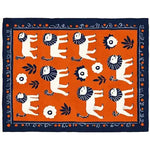 Vibrant hand-tufted area rug featuring playful lion motifs on an orange background, perfect for adding a whimsical touch to dining room carpets or as a wool rug under a dining table.