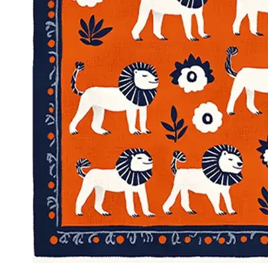 Vibrant Lion's Parade Hand Tufted Area Rug featuring playful lion designs with bold orange and navy hues. Perfect as a dining table rug or dining room carpet, this wool rug adds charm and warmth to any dining room setting.
