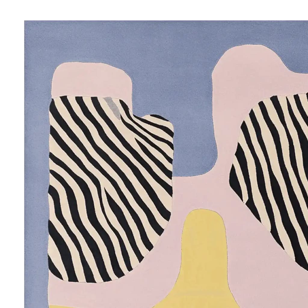 A contemporary area rug featuring an abstract design with zebra-like stripes in black and white, surrounded by pastel shades of blue, pink, and yellow. This wool rug is perfect for adding a modern touch to your living room, especially in an 8x10 size.