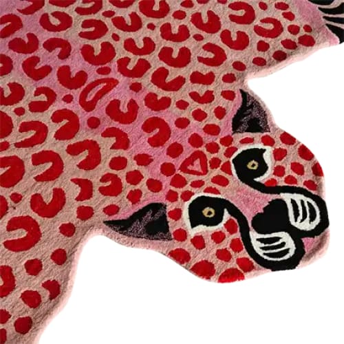 Vibrant Little Pink Leopard hand-tufted wool rug, perfect as an area rug for living room or bedroom. The playful and bold leopard design adds a unique touch to any space, ideal for those looking for living room rugs 8x10 or stylish wool rugs for the bedroom.