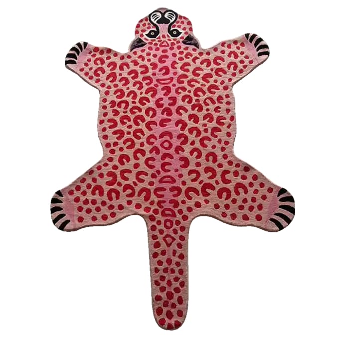 A charming Little Pink Leopard hand-tufted wool rug designed to resemble a playful animal shape. Perfect for adding a touch of whimsy to living rooms or bedrooms, this area rug measures 8x10 and combines vibrant pink patterns with a cozy, soft texture.
