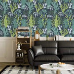 Living room with Underwater Flora Wallpaper, black leather sofa and wood shelf