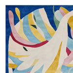 Vibrant area rug with abstract design, showcasing a blend of blue, yellow, and pink hues. This contemporary wool rug is perfect for adding a splash of color to any living room. Ideal for those seeking large living room rugs with a modern touch.