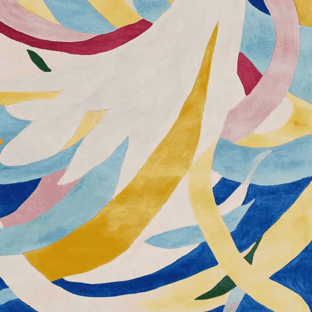 Colorful abstract design of the Loam of Thought Hand Tufted Rug, showcasing a vibrant mix of blue, yellow, and pink swirls. Perfect contemporary area rug for adding a splash of color to your living room decor. Made from wool, this large living room rug combines style and comfort.