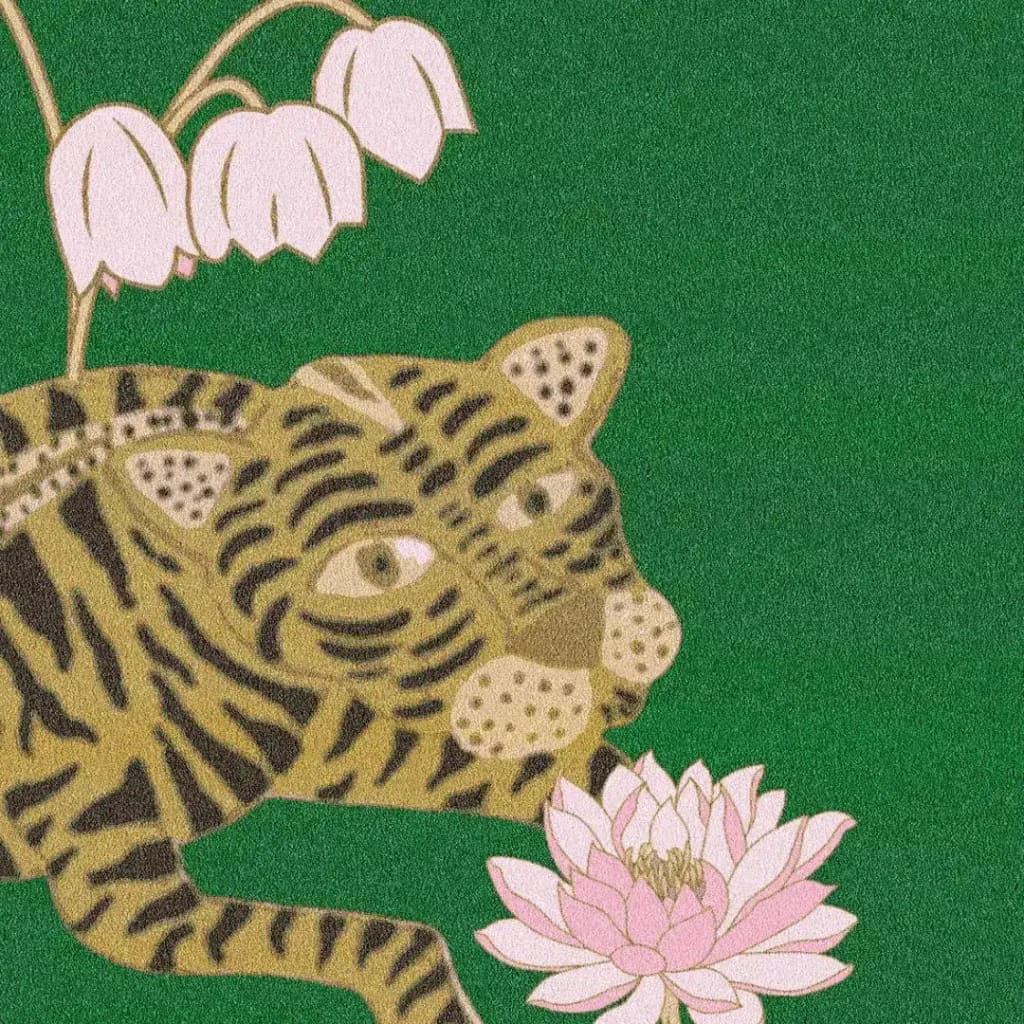 This vibrant area rug features an abstract design of an Indian tiger and lotus flowers on a lush green background, perfect for adding a boho touch to dining room carpets. Ideal for large area rugs in both living room and dining room settings, this hand tufted wool rug brings a unique flair to your home decor.