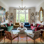 Living room with colorful rug, furniture and decorative elements