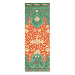 The Lotus in the Pond Hand Tufted Rug features an intricate floral pattern with vivid green and orange hues, perfect for adding a touch of elegance to your dining room or office. This wool area rug, with its detailed design, brings warmth and sophistication, making it an ideal choice for living room and dining room rugs.
