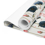 Close-up of rolled Lotus Reflection yoga mat, white underside and watercolor lotus blossom edge
