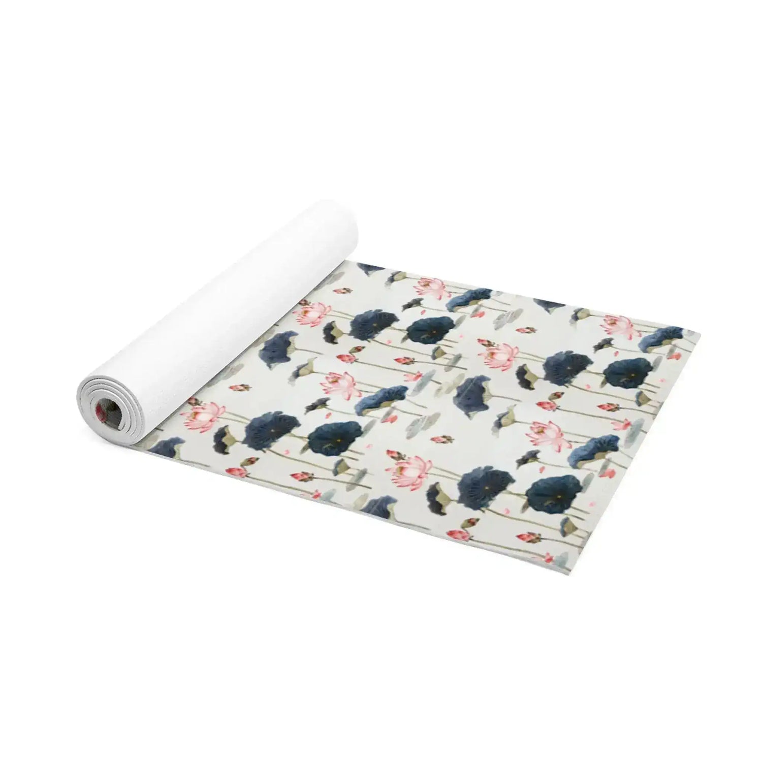Lotus Reflection yoga mat partially rolled, pink lotus and navy bloom print on pale cream ground