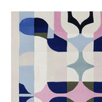 Top view of the Loud Geometry Archive Hand Tufted Rug, showcasing a vibrant abstract design. This contemporary area rug features a mix of bold colors like blue, pink, and green, making it a perfect wool rug for modern living room decor. Ideal for those seeking living room area rugs in an 8x10 size.