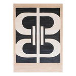 Top view of the Lunar Cascade Knotted Wool Rug, featuring a bold geometric design in black and beige tones. This contemporary area rug is perfect for enhancing modern living rooms with its stylish pattern and soft wool texture.