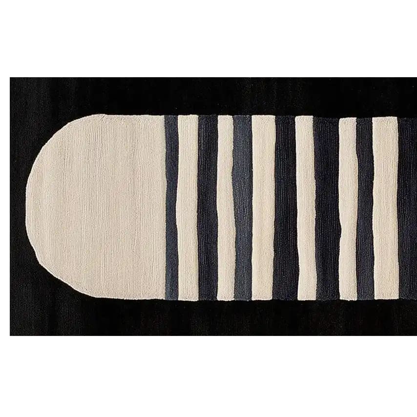 Top view of the Lunar Horizon Hand Tufted Wool Rug showcasing its contemporary design with bold black and white stripes. Perfect as a runner rug for kitchens or hallways, this wool rug adds a modern touch to any space, making it ideal for kitchen runner rugs or bathroom runner rugs.