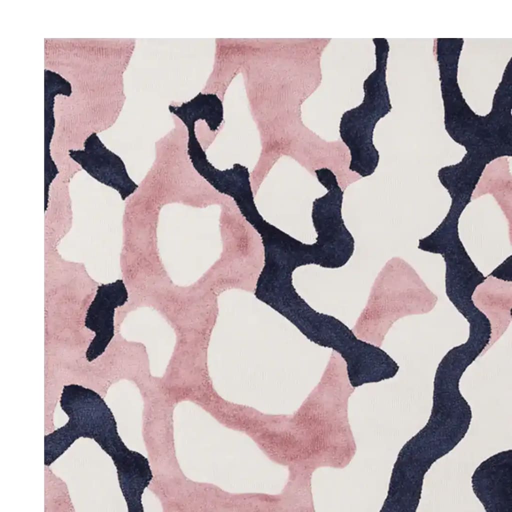 This Lush Fragment Field Hand Tufted Area Rug features a contemporary abstract design with soft pink, dark blue, and cream tones. Made from high-quality wool, this rug is perfect for adding a modern touch to your living room. Ideal for spaces needing an 8x10 size, it's both stylish and functional.