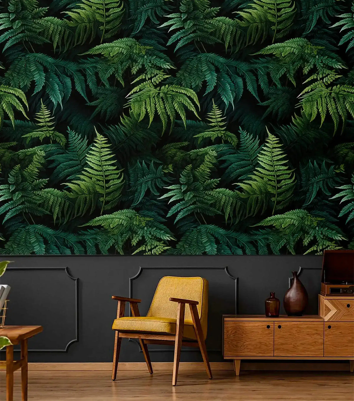 Lush green fern jungle wallpaper above charcoal panelling with yellow chair and wood sideboard