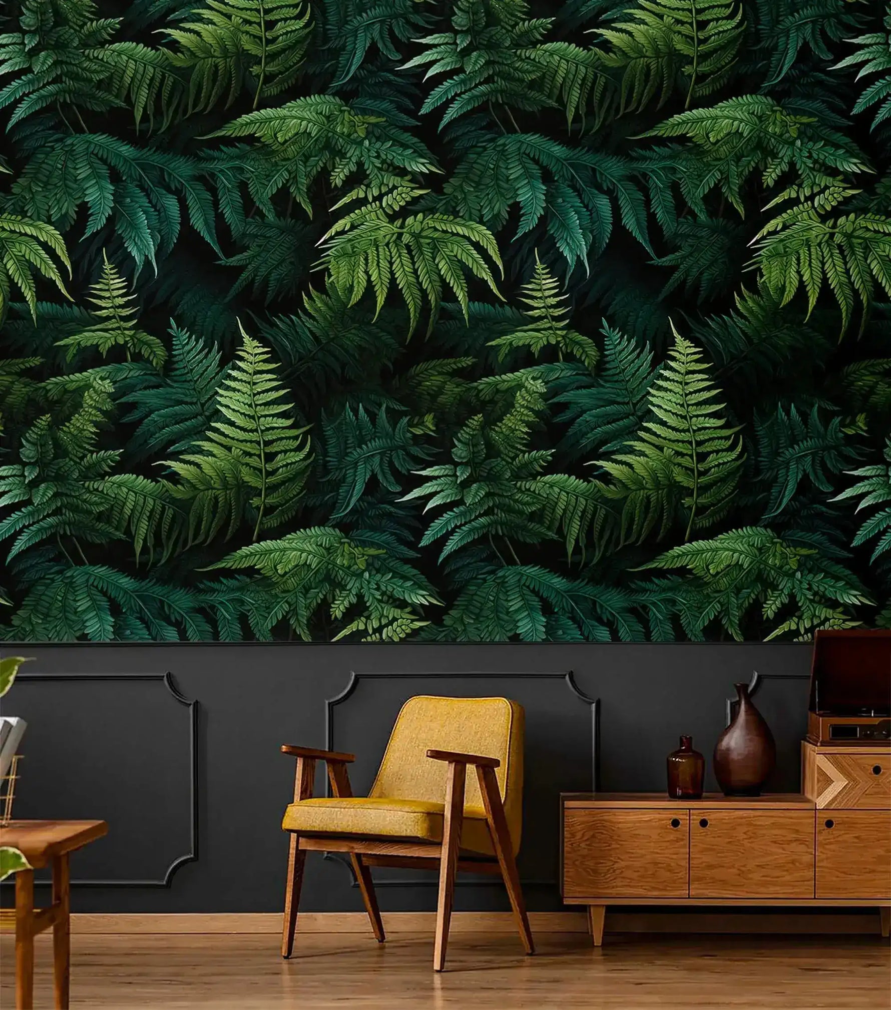Lush green fern jungle wallpaper above charcoal panelling with yellow chair and wood sideboard