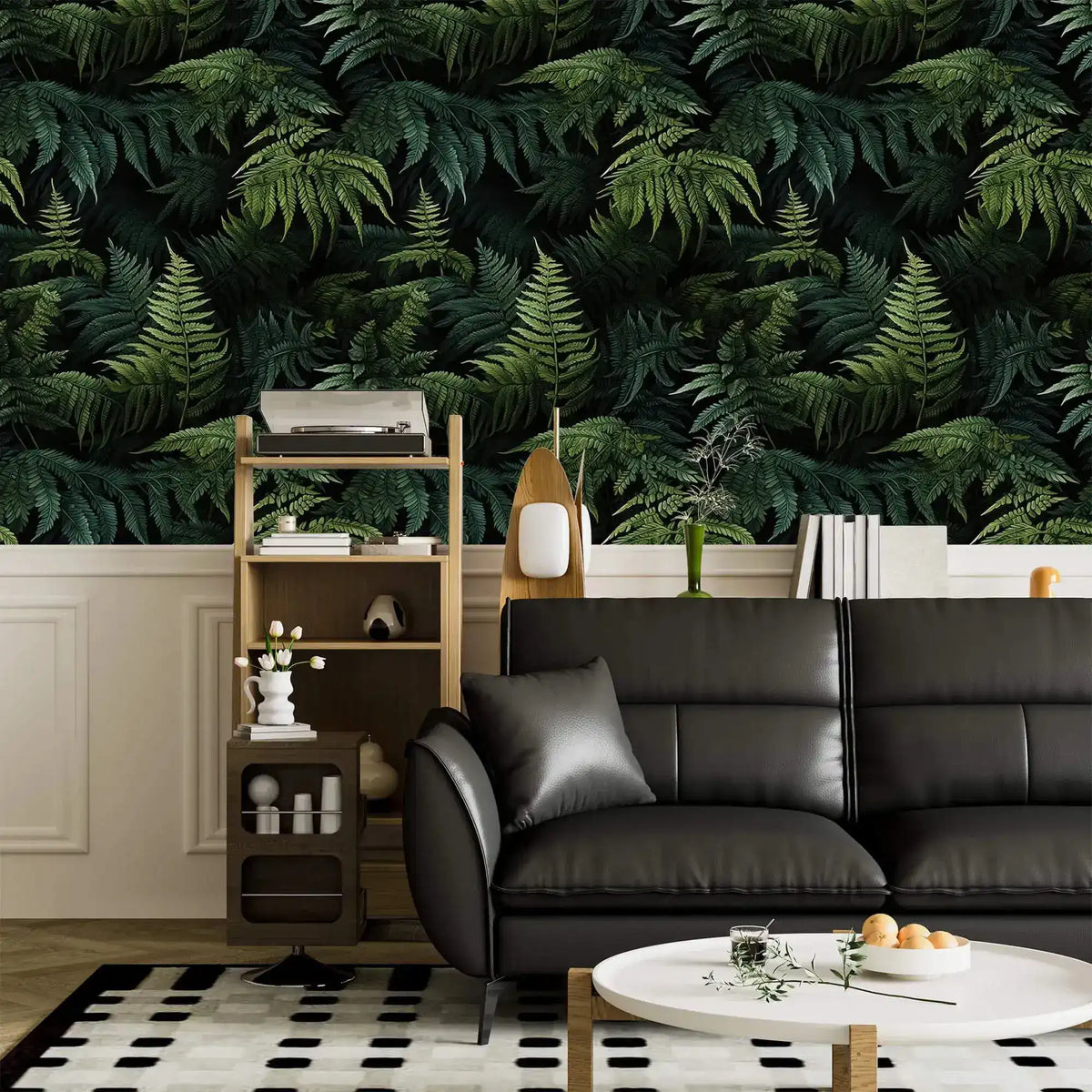 Lush green fern jungle wallpaper above white panelling with black leather sofa and shelf