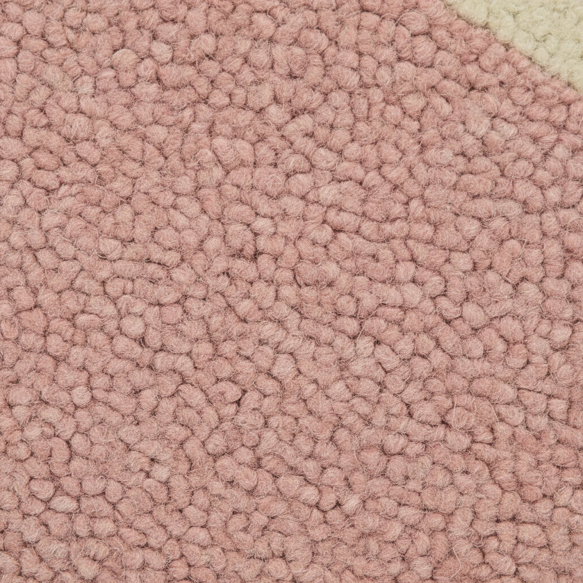 Close-up of pink textured carpet