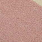 Close-up of pink textured carpet