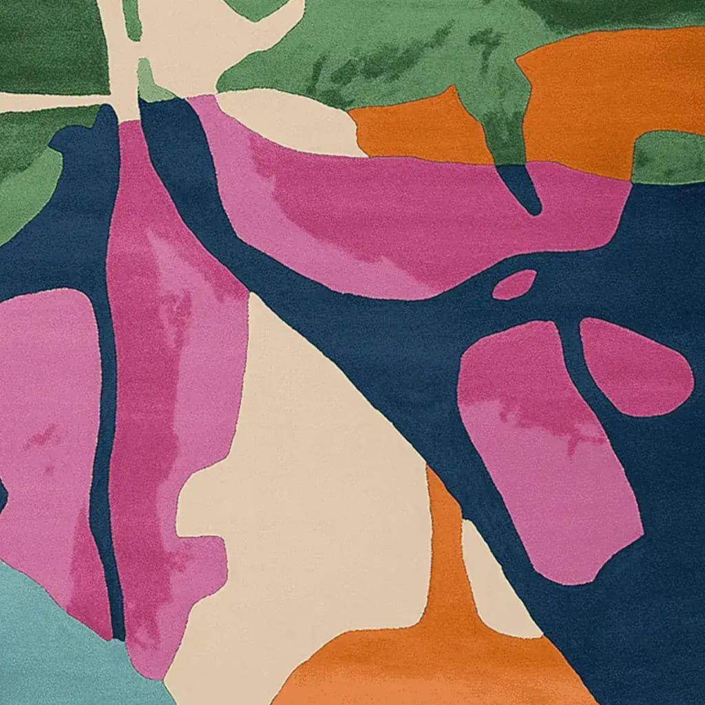 Vibrant abstract design of the Lush Layers Hand Tufted Rug showcasing bold colors including pink, green, orange, and blue on a wool surface. Perfect for adding a contemporary touch to living room area rugs, this square area rug comes in an 8x10 size, ideal for enhancing any modern home decor.