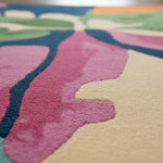 Close-up of a colorful floral-patterned rug with soft focus