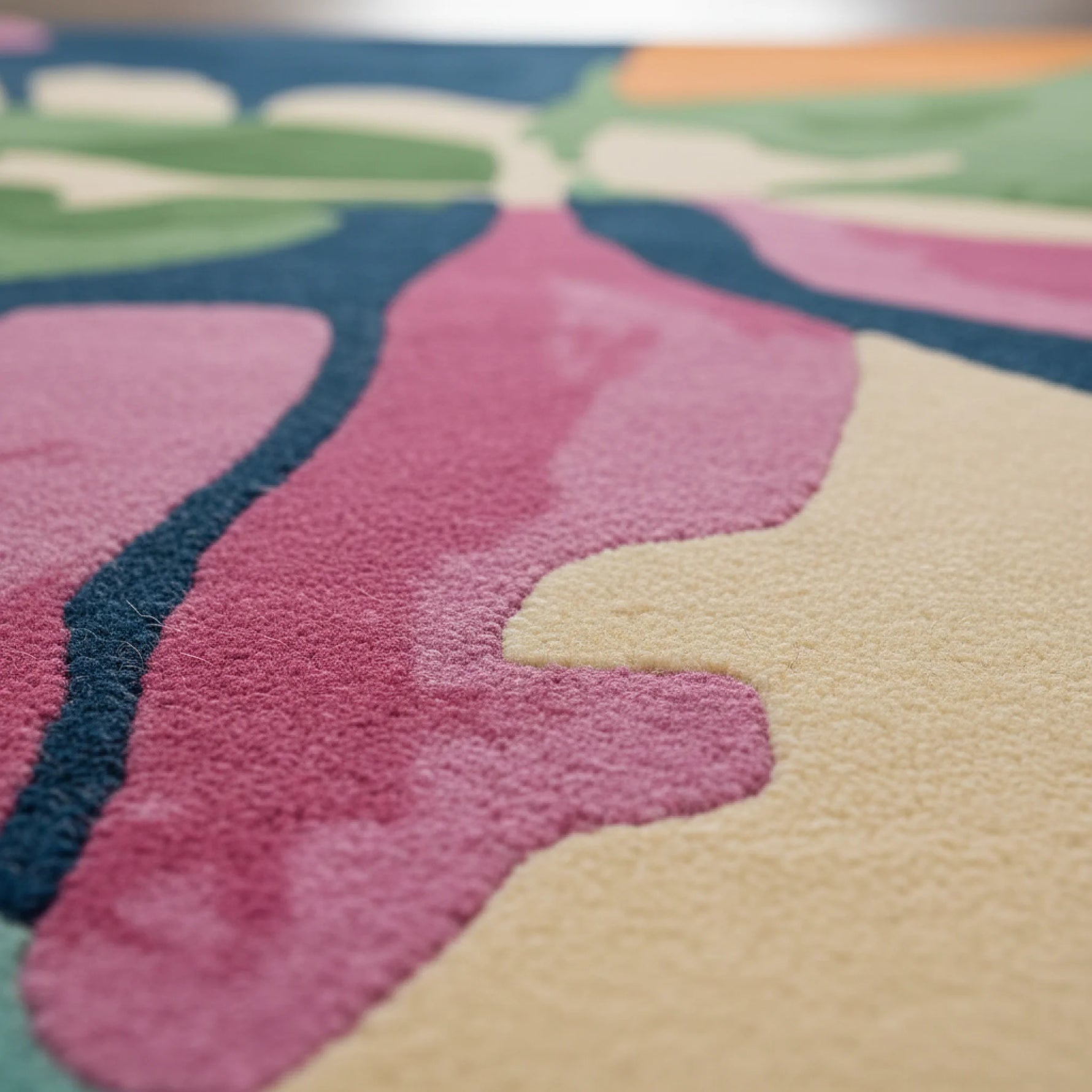 Close-up of a colorful floral-patterned rug with soft focus