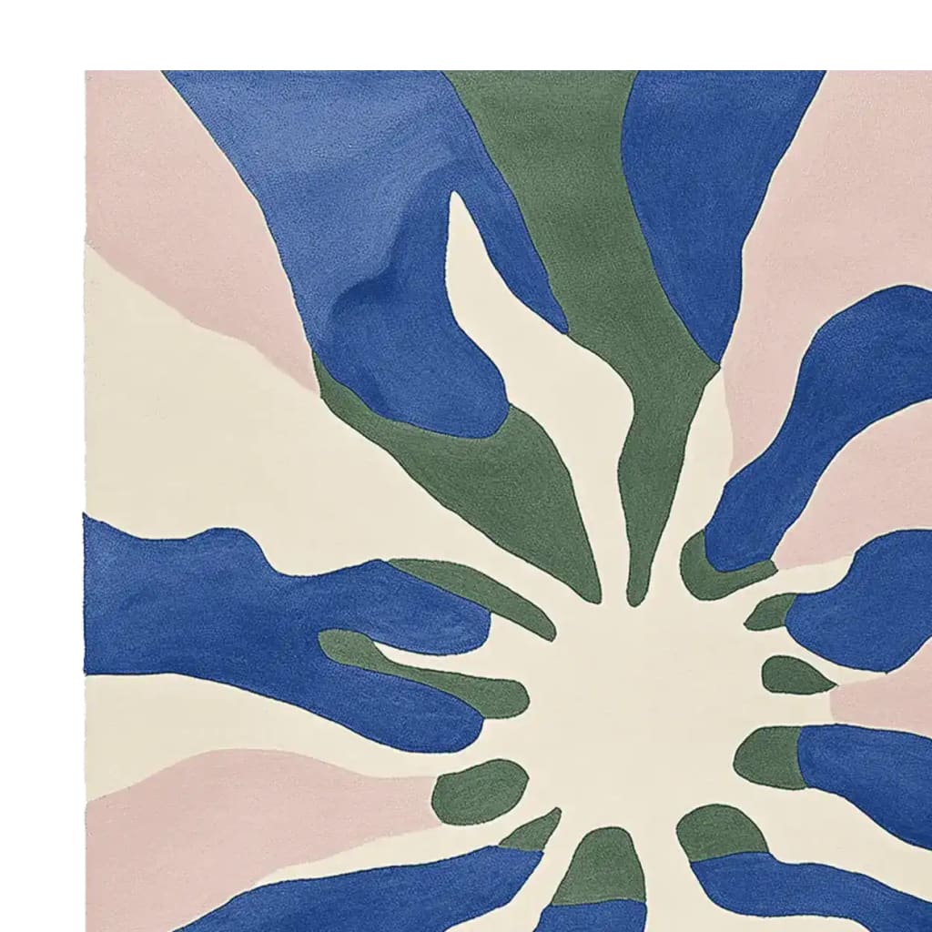 A vibrant area rug featuring an abstract design with bold blue, green, and pink swirls on a cream background. This contemporary wool rug is perfect for adding a touch of modern elegance to living room area rugs.