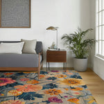 Beautiful Lush Petal Elysium Hand Tufted Area Rug in a contemporary living room setting, showcasing vibrant floral patterns with a vintage charm. The 8x10 wool rug adds a splash of color and elegance, perfect for dining room carpets or living room decor.
