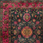 This elegant Luxe Crimson Labyrinth Hand Knotted Area Rug showcases a rich vintage design with intricate floral patterns. Perfect for adding a touch of elegance to any living room, this 8x10 Persian rug features a vibrant combination of deep crimson and black tones, accented with delicate floral motifs that evoke a timeless charm.