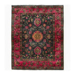 Luxe Crimson Labyrinth Hand Knotted Area Rug featuring a vibrant floral design with intricate patterns, reminiscent of vintage Persian rugs. This 8x10 living room rug showcases a rich crimson and black color palette, perfect for adding elegance to any space.
