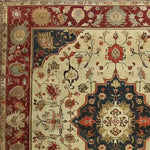 Close-up of a Luxe Floral Medallion Hand Knotted Area Rug showcasing intricate floral patterns in rich colors. This square area rug is perfect for living rooms, measuring 8x10, and features a vintage Persian design. Made from high-quality wool, this rug adds elegance and warmth to any space.