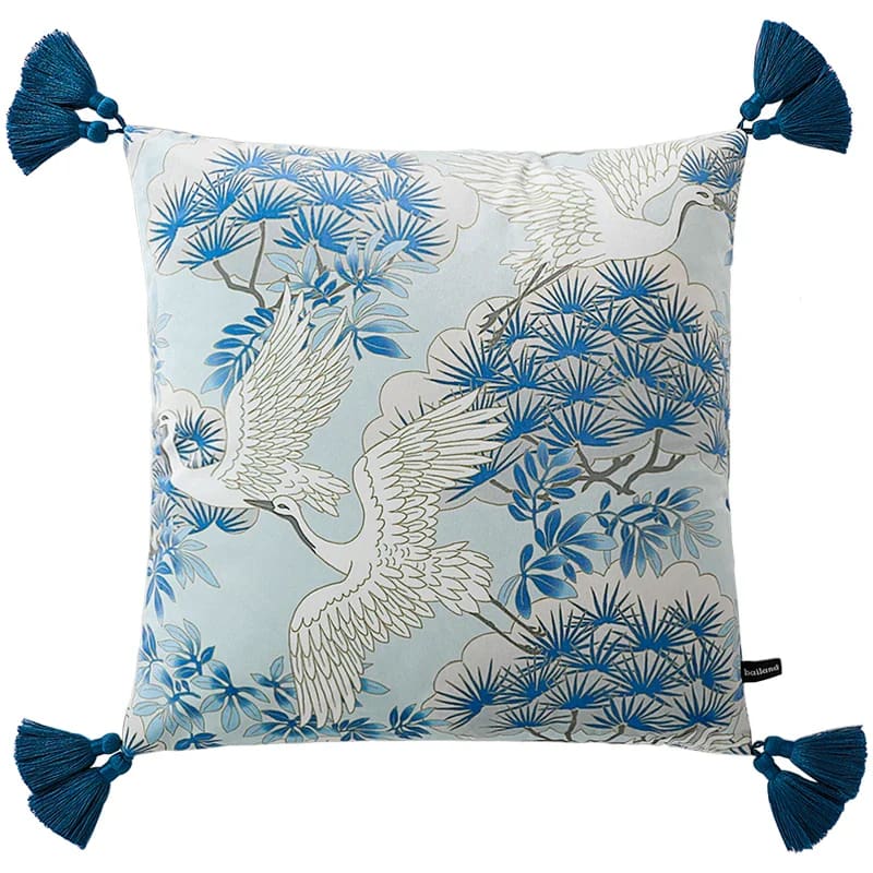 Luxurious throw pillow featuring a crane and pine tree design with decorative tassels, perfect for home decor