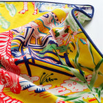 Luxurious throw pillow featuring a vibrant lemon pagoda and zebra design, perfect for adding a splash of color to your home decor.