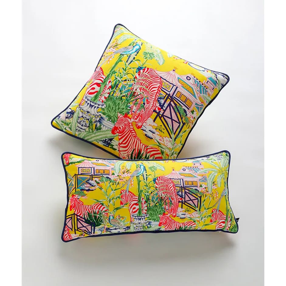 Luxurious throw pillows featuring vibrant lemon yellow color with zebra and pagoda designs, perfect for adding a pop of color and style to your home decor.