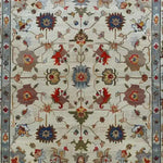 Luxurious Petal Weave Hand Knotted Area Rug featuring a vintage floral design with intricate Persian patterns. This 8x10 living room rug displays a harmonious blend of earthy tones and vibrant reds, adding elegance and warmth to any space.