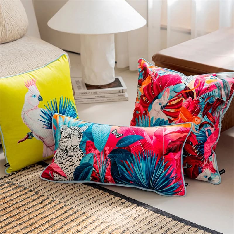 Colorful tropical throw pillow featuring a vibrant cockatoo design, perfect for adding a luxurious accent to your home decor.