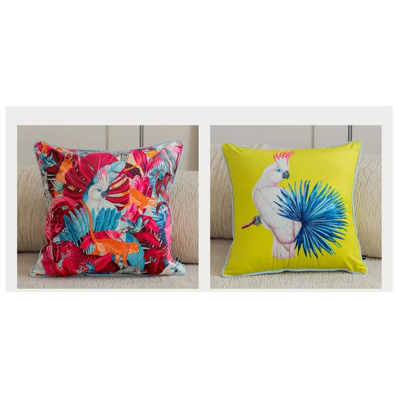 Luxurious tropical throw pillow featuring vibrant cockatoo and floral patterns, perfect for accenting any living space.