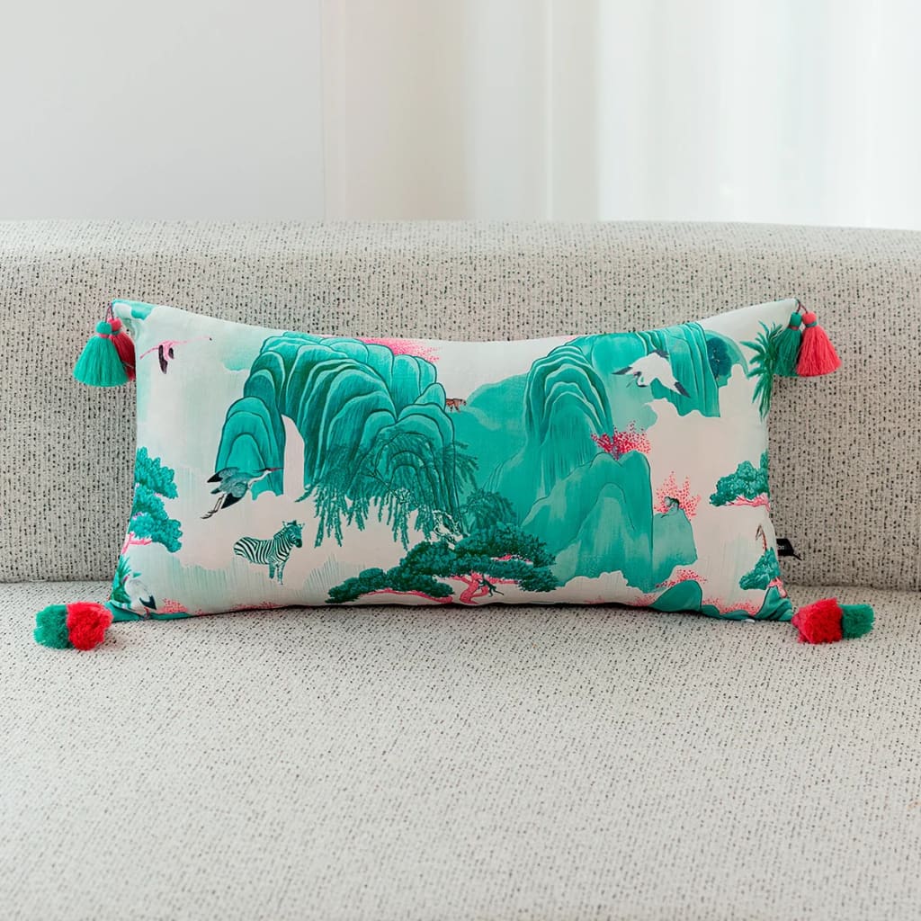 Luxurious throw pillow featuring a vibrant zebra and tropical jungle design, accented with colorful tassels, perfect for home decor.