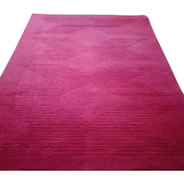 Top view of a Magenta Artic Geo Modern Hand Tufted Wool Rug, showcasing its vibrant color and geometric pattern. Perfect for a contemporary dining room, this large area rug adds a touch of elegance as a formal dining room carpet.